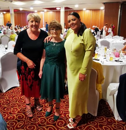 NWCDP management and friend at the Ball