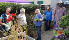 Garden crew at work in our community space 